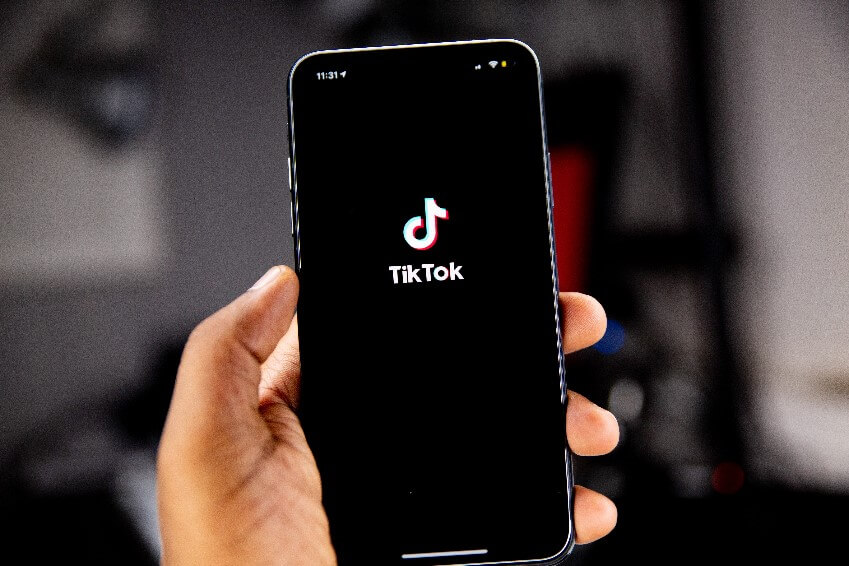 Tiktok app opening on a phone